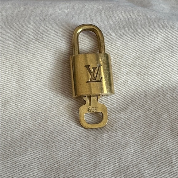 Louis Vuitton Accessories - Louis Vuitton Lock and Key Set Gold Tone Monogram Padlock 309